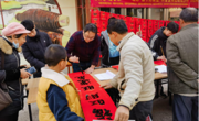 韶关乐昌市科协开展“迎新春 送春联”——助力“百千万工程”科普宣传进乡村活动